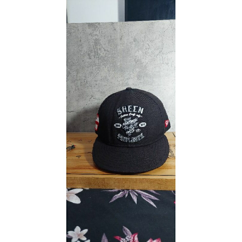 666 sheen new era topi