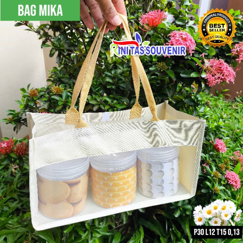 

Tas Nastar Kaleng Tas Kue Nastar Tas Polyester Tas Hampers Lebaran Tas Idul Fitri Transparan Tas Mix Mika