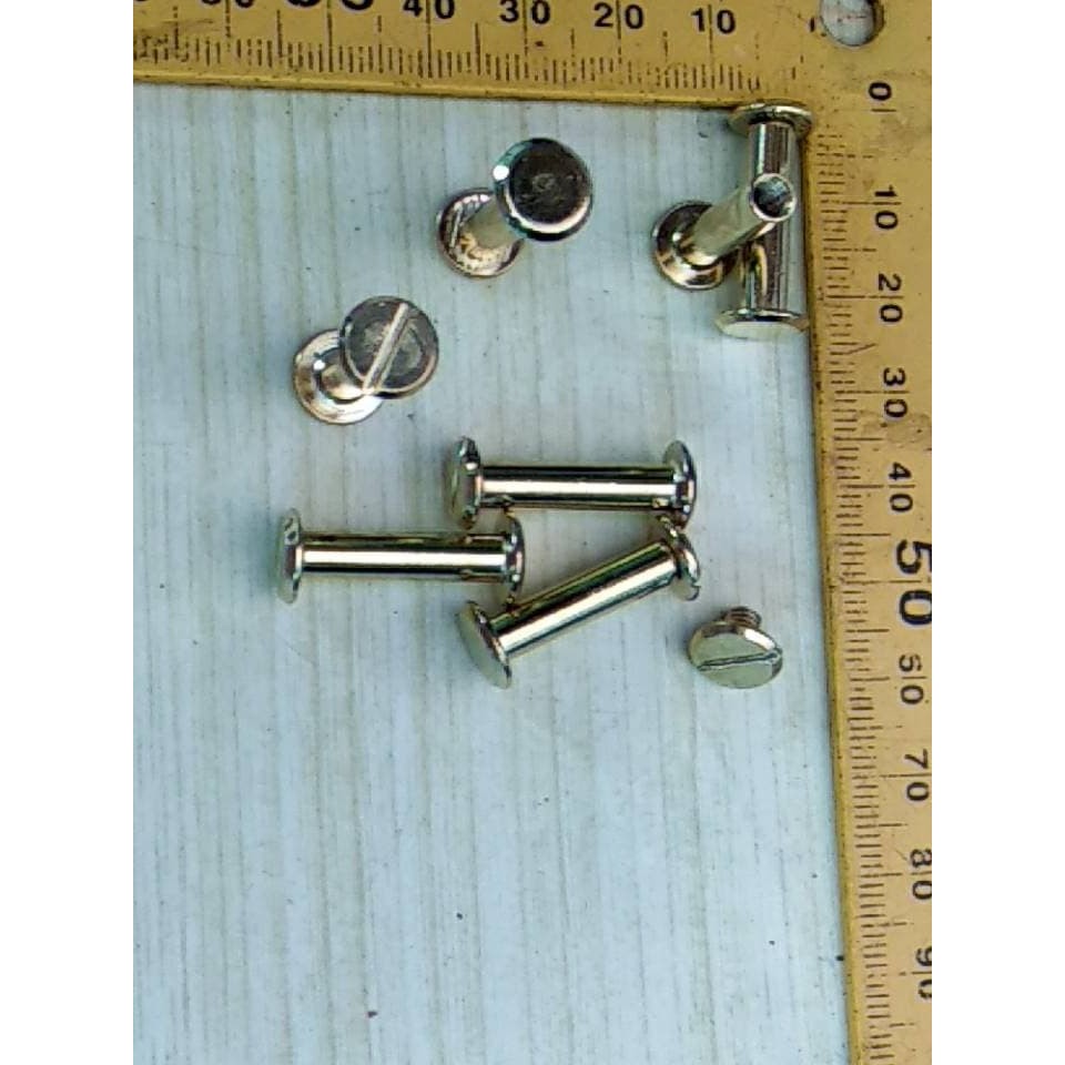 

Baut Jilid buku 20 mm (obeng minus) warna emas muda