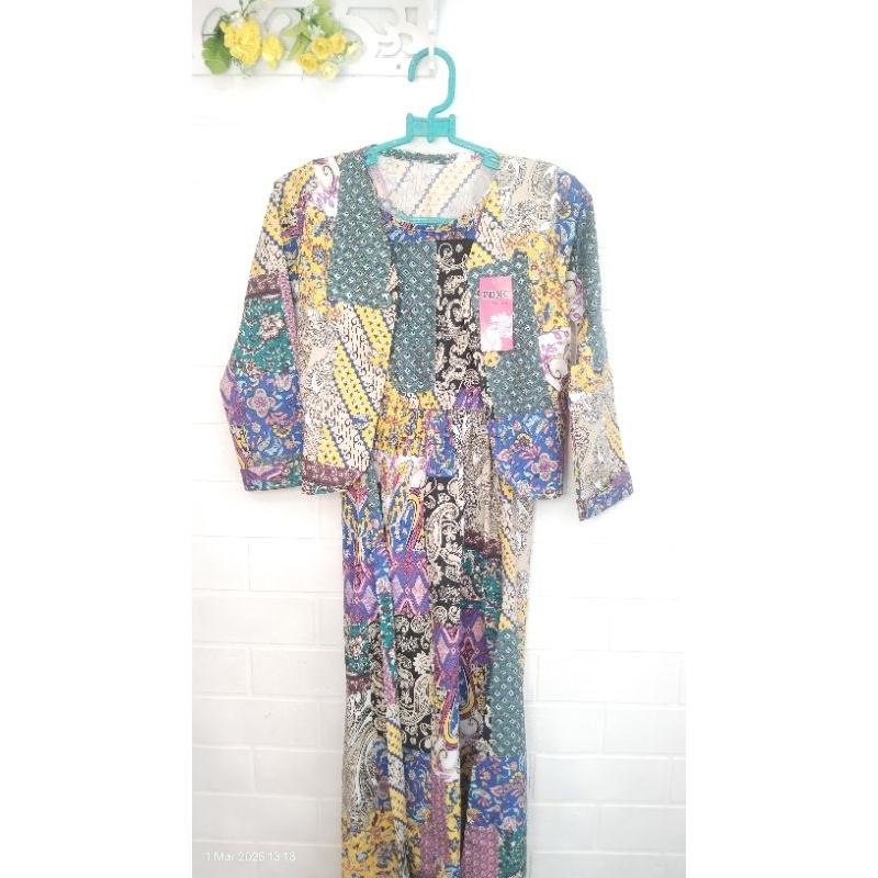 Pakaian wanita setelan rompi