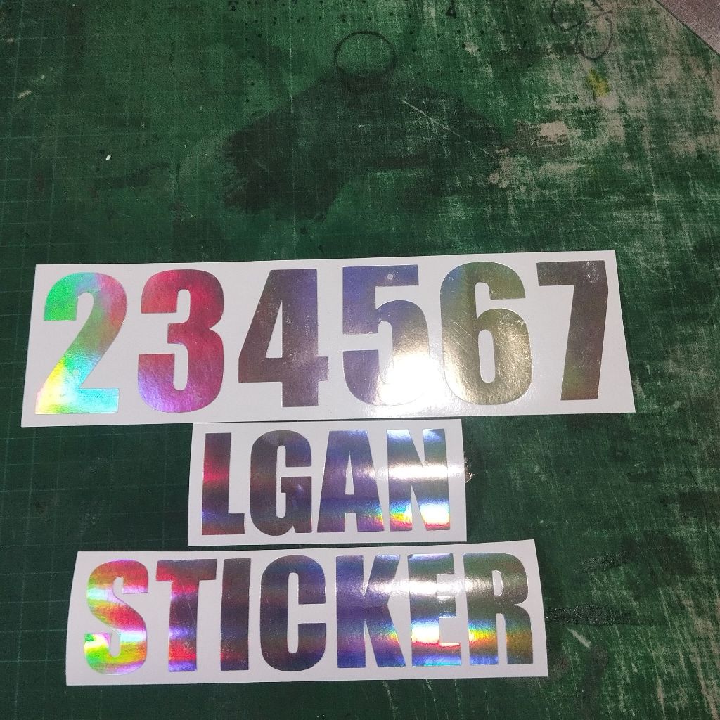 

STIKER TULISAN ATAU ANGKA JUGA BISA UTK DITEMPEL DI KACA / ETALASE BAHAN HOLOGRAM KEREN UK 7 CM