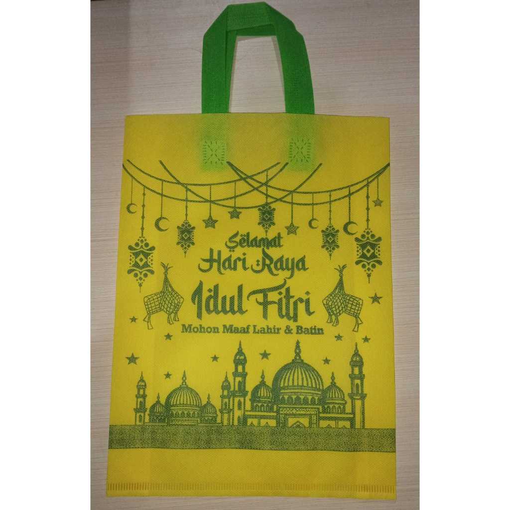 

( LUSINAN ) Tas Spunbond Kain Lebarn Goodie bag Idul Fitri uk:25x35x8 1 Sisi