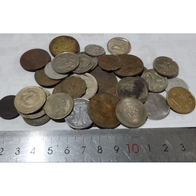 250 gram koin luar negri acak sesuai stok yg ada kondisi apa adanya tidak rusak