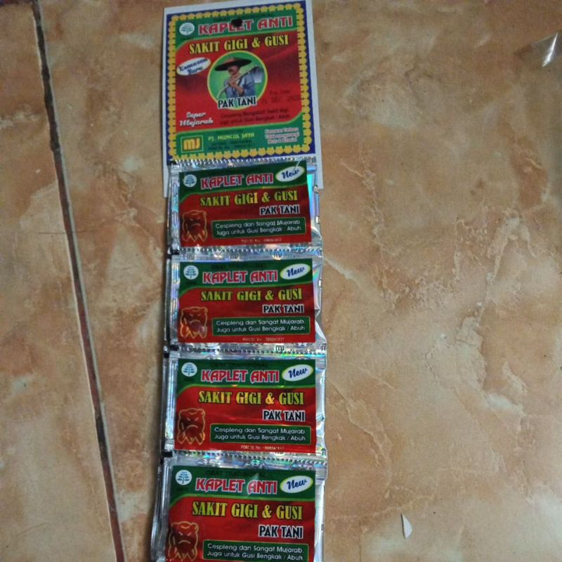 Obat sakit gigi dan gusi cap Pak Tani