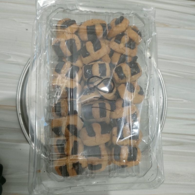 

kue kering coklat pita 1/2kg, manis dan lembut dimulut