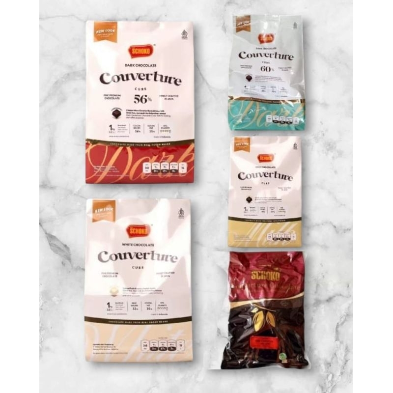 

Schoko Couverture Chocolate Dark 56 % 58 % 60 % / White / Milk Cube Kemasan 1 kg