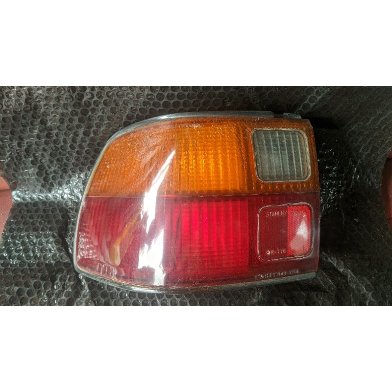 stoplamp lampu belakang ford laser gala tahun 1991-1995 original