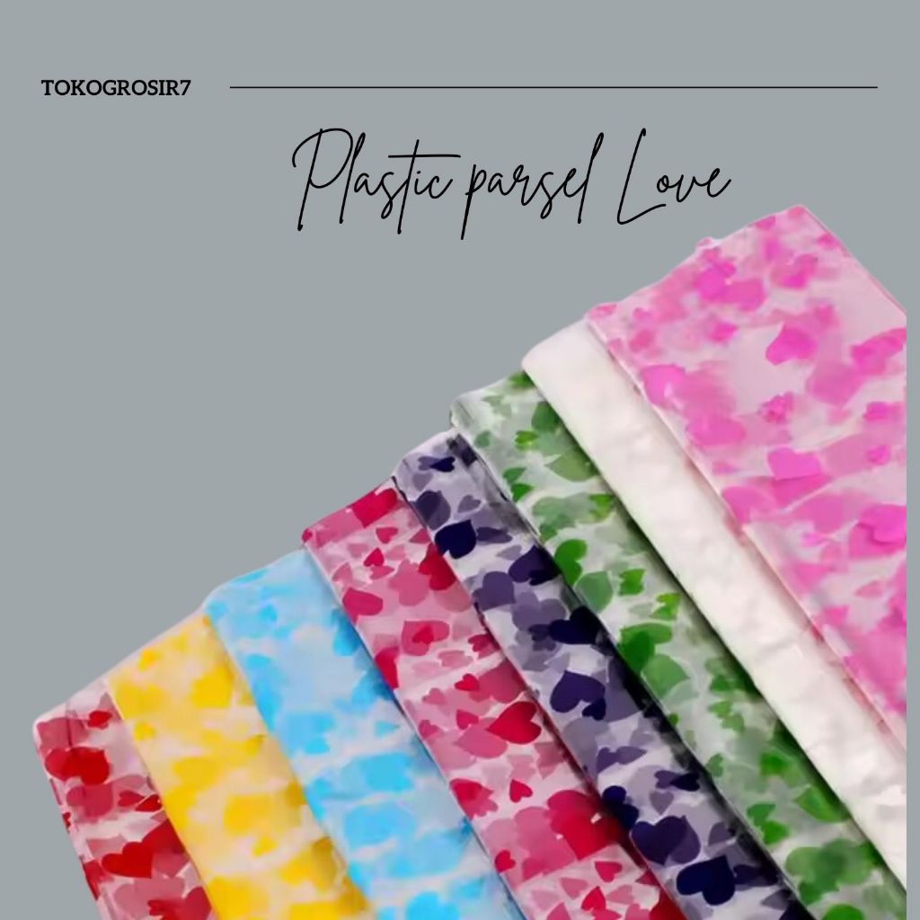 

KERTAS BENING PLASTIK PEMBUNGKUS KADO MOTIF LOVE CELLOPHANE UK ( 50CM X 70 CM )