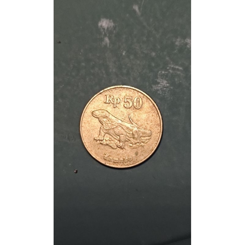koin 50 komodo