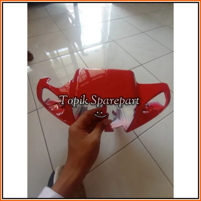 batok kelapa dengan Yamaha Fizr warna merah