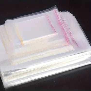 PLASTIK OPP IMP LEM  / PLASTIK OPP ISI BUNGKUS BAHAN MANIK / PERLENGKAPAN RUMAH