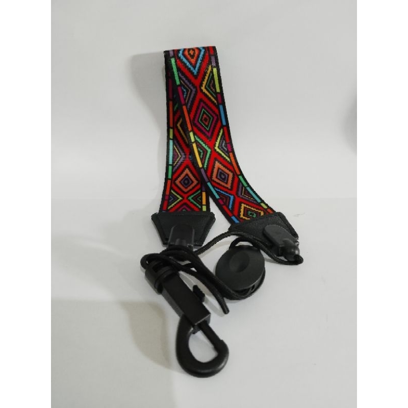 Strap saxophone corak