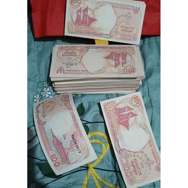 uang duit kertas asliv Rp 100 rupiah Original Perahu pinisi gunung anak Krakatau ORI koleksi kolekto