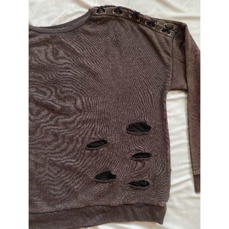 Ripped sweater