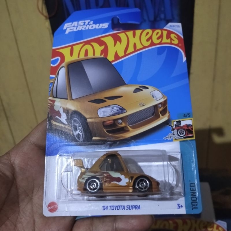 hotwheels supra tooned 94 toyota supra tooned gold 2024
