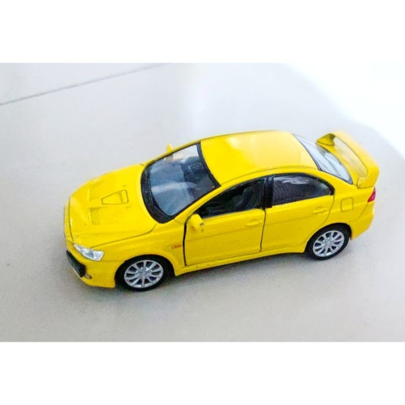 Diecast Kinsmart Lancer kuning evolution lancer Ex