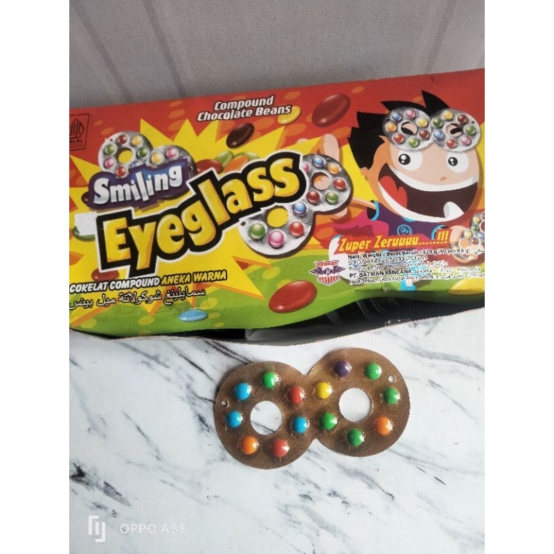 

Permen smiling eyeglass coklat coumpon aneka warna satuan - AnggunYusuf Collections