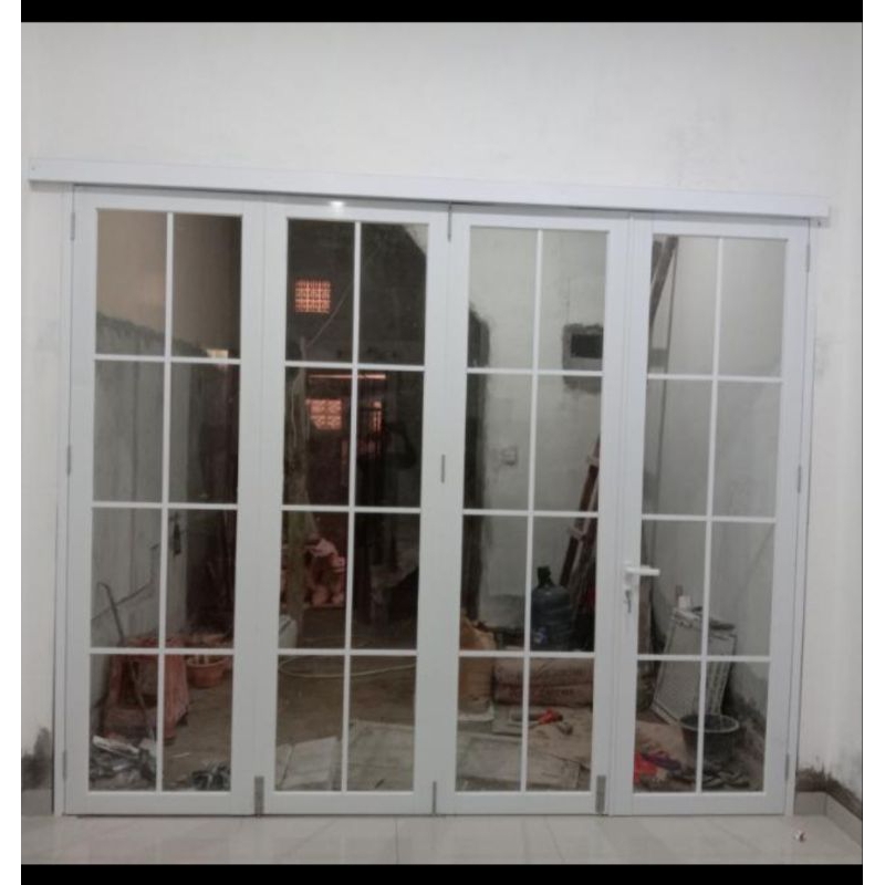 Pintu lipat 4 Dau sigel 1 daun aluminium merek forta kusen " + kaca 5mm Riben. + pemasangan. ukura T