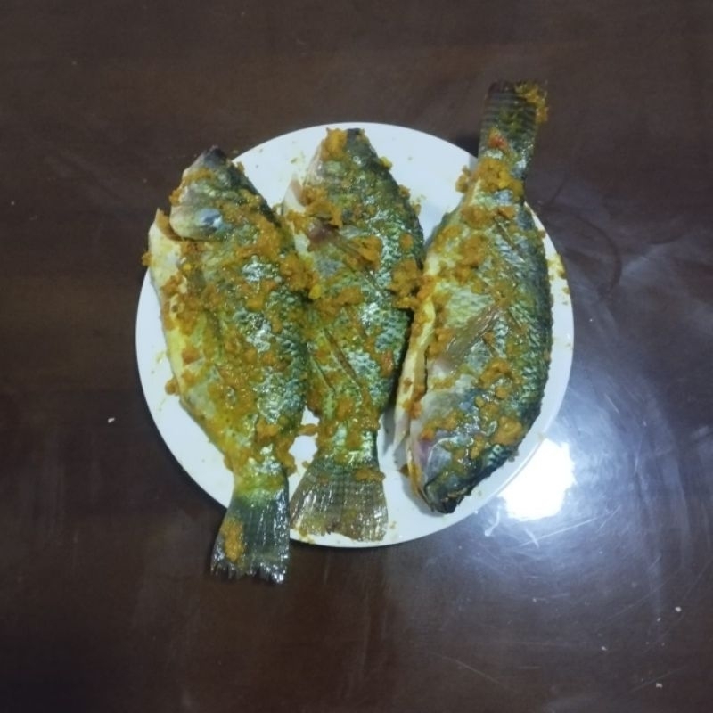

ikan nila bumbu kuning siap Goreng / Bakar 500 Gr 3-4 Ekor