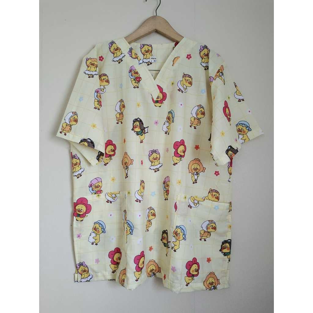 Baju jaga dokter / Baju perawat / Baju KoAs motif karakter bebek warna kuning