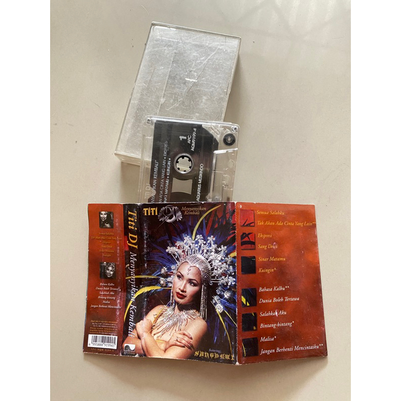 Kaset Titi DJ - Menyanyikan kembali