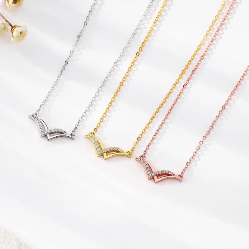 kalung titanium wanita liontin burung camar huruf v ganda