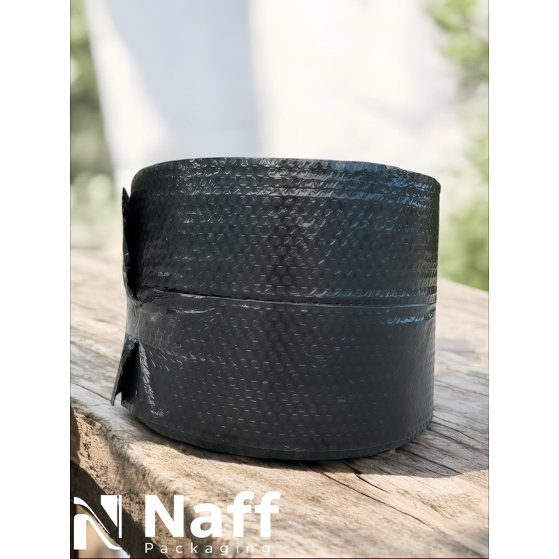 

BUBBLE WRAP PACKING TEBAL POTONGAN 30cm X 50m DENGAN CORE
