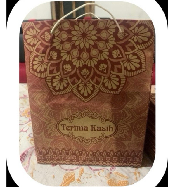 

PAPERBAG PESTA MOTIF 100 PCS. uk 17x21x5. PAPER BAG PERNIKAHAN.