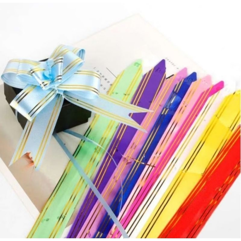 

(Isi 10 pcs) 23 MM Pita tarik list emas hiasan parcel / pita serut / pita kado list gold souvenir