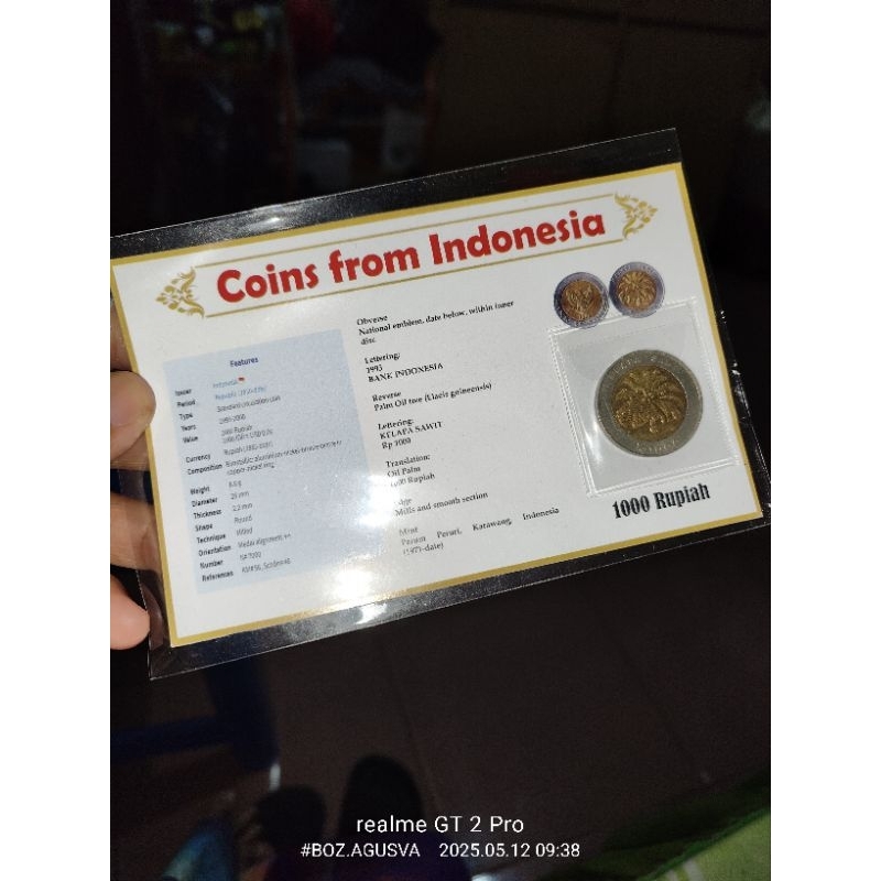 Koin Kuno 1000 Kelapa Sawit dan Foldernya