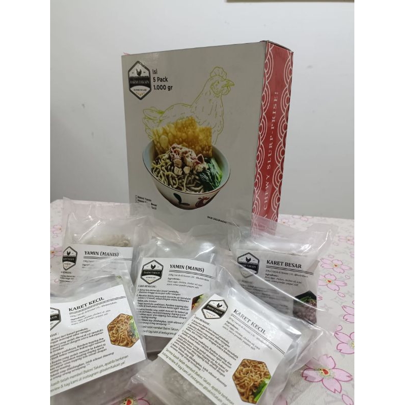 

Bakmi YAMIN Takain Kemasan Box isi 5 pcs Bakmi Frozen