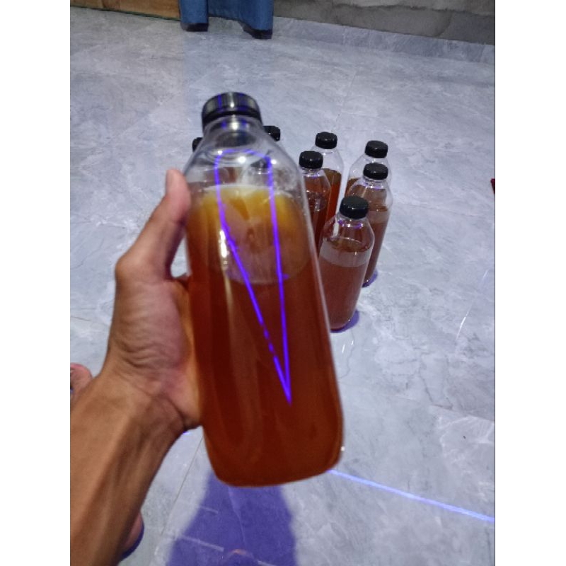 

madu sialang ukuran 1000g (1kg)