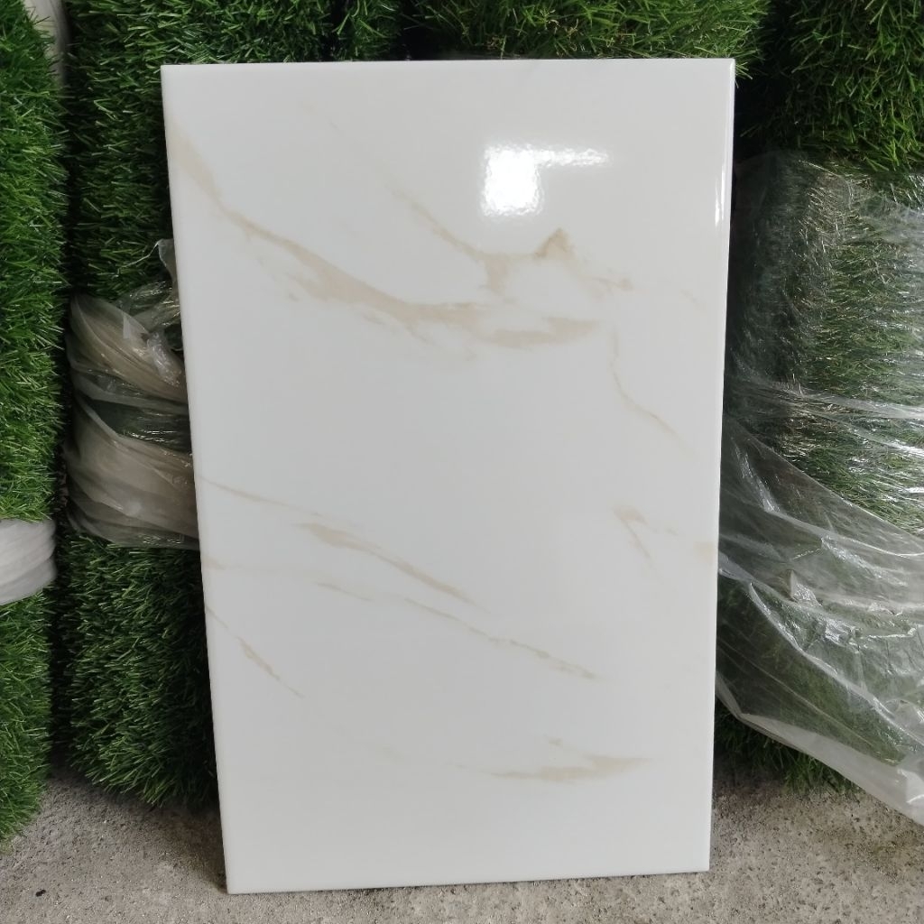 KERAMIK DINDING 25X40 GLOSSY WHITE CARARA CREAM