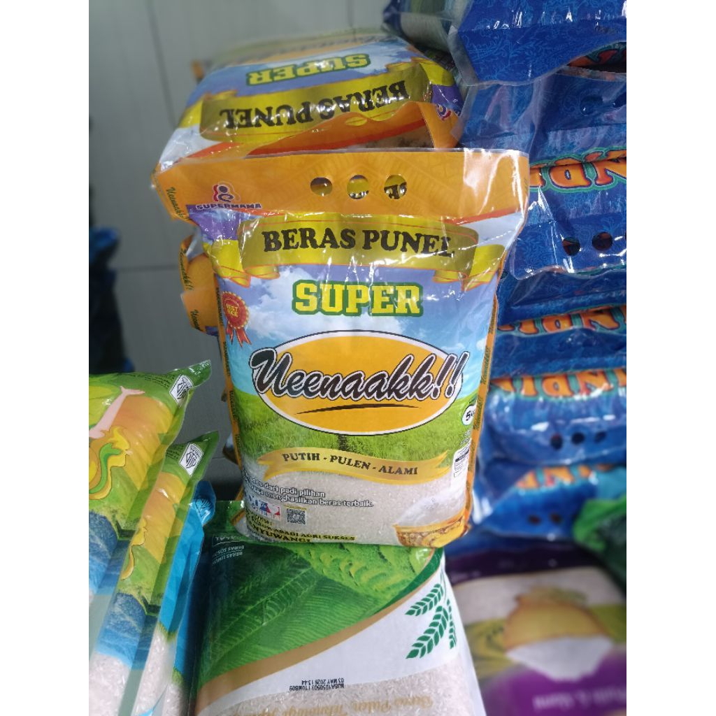 

beras super uenakk