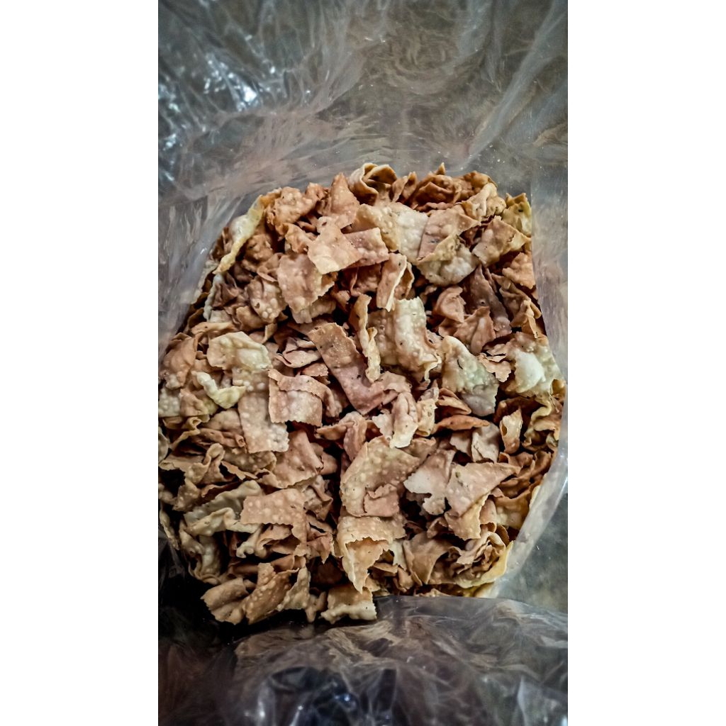 

KERUPUK PANGSIT RASA BAWANG-RENYAH GURIH DAN 100% TAMPA PENGAWET MAKANAN