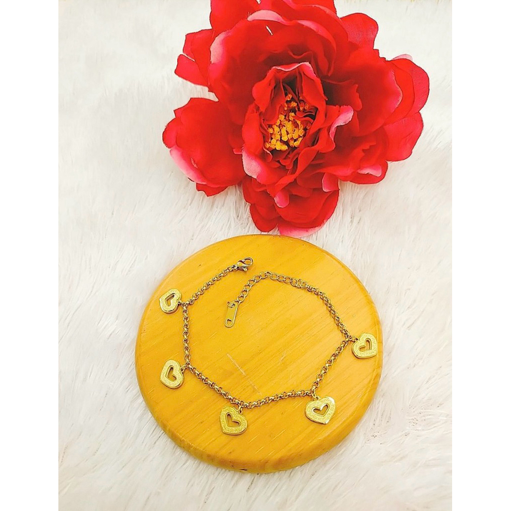 gelang mainan love titanium