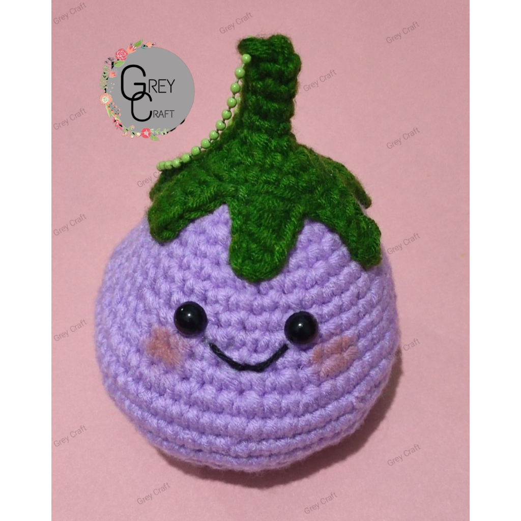 Boneka rajut terong besar