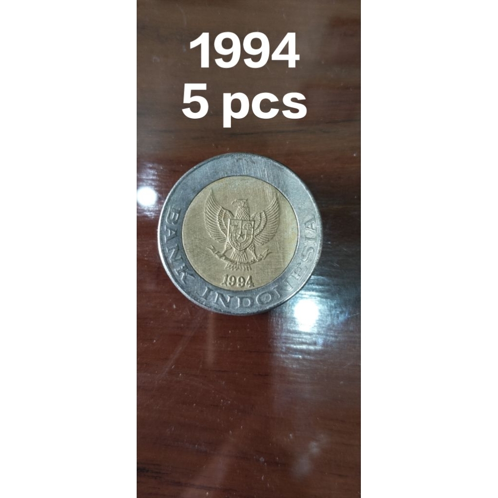 Uang koin 1000 kelapa sawit emisi 1994