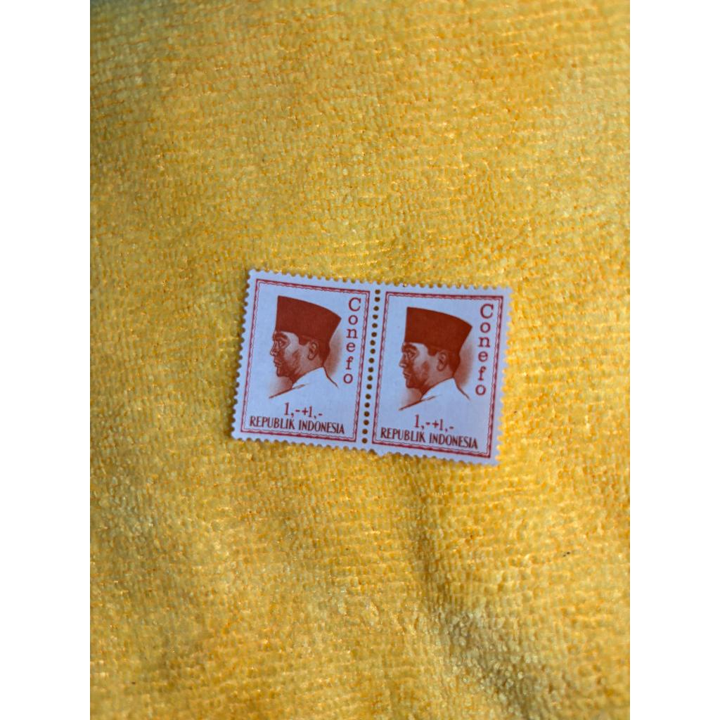 

perangko indonesia 1,-+1,- confeno gandeng 2