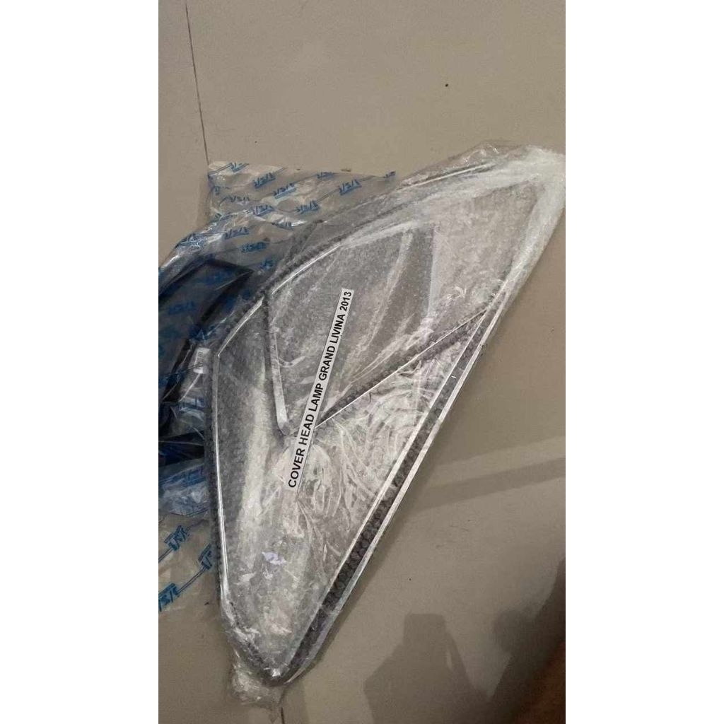 Garnish headlamp Grand Livina L11