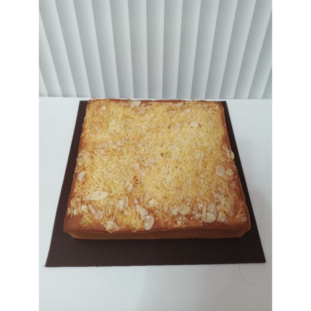 

Bolu Tape topping Keju Almond size 20*20cm