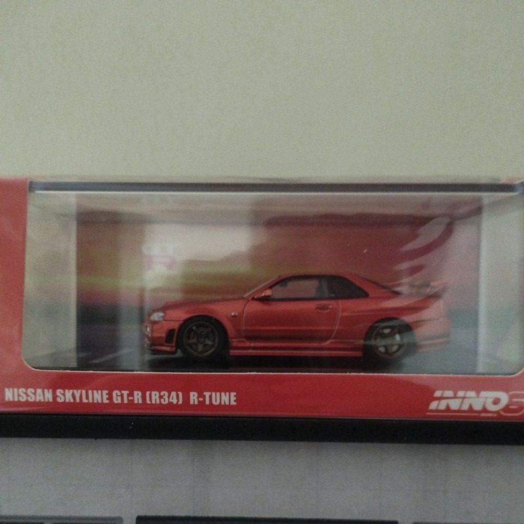 Inno64 Nissan Skyline R34 Metallic Orange