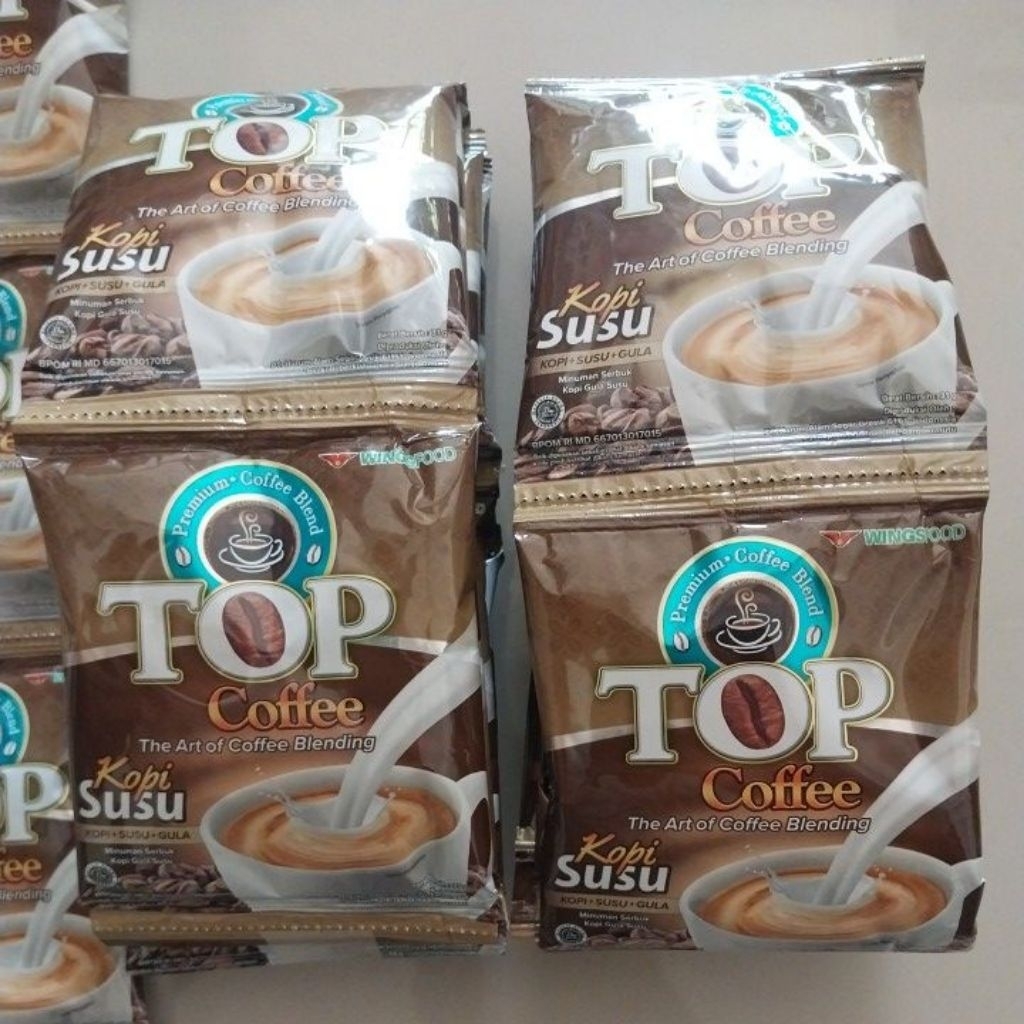 

TOP COFFE kopi susu 1 Renceng isi 12 Sachet