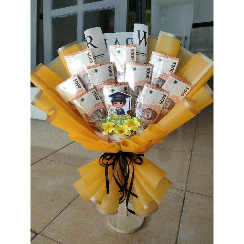 

Buket U ang pecahan 5000/ 10 lembar