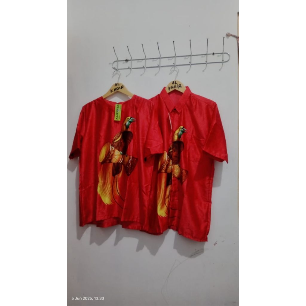 PASANGAN BLUSS BAJU PRIA-WANITA LD:110 BATIK PAPUA MOTIF BURUNG CENDRAWASIH DI JAMIN YANG TERMURAH T