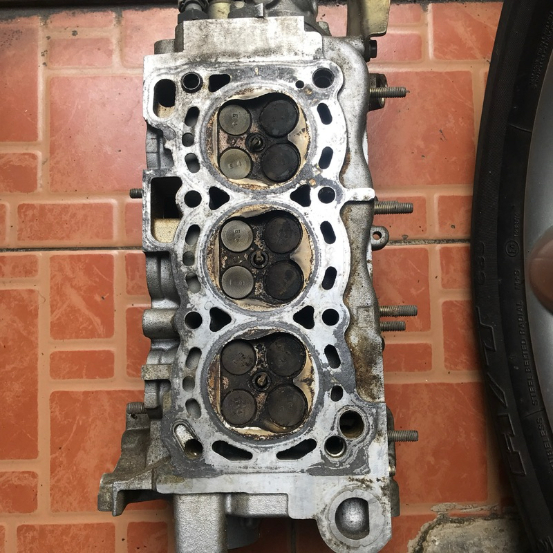 cylinder head silinder head Xenia 1000cc/1300 cc komplit copotan