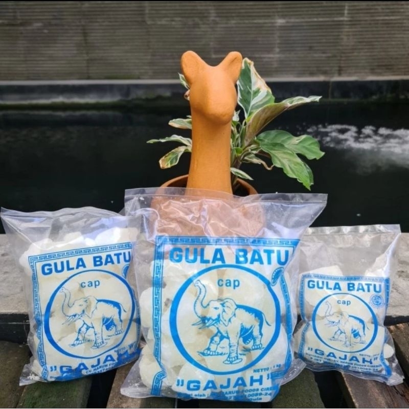 

Gula Batu Cakar Putih Cap Gajah KEMASAN 1 KG