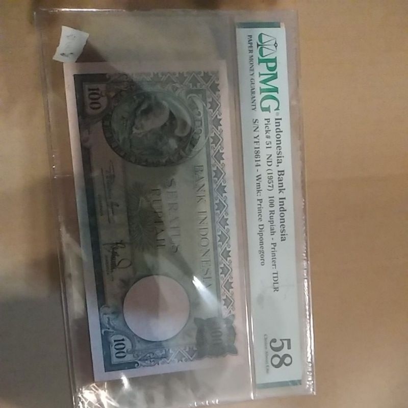 100 tupai 1957 pmg 58 polos