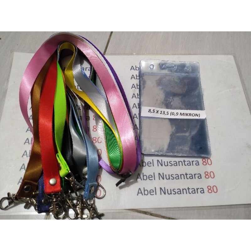 

paket Tali 1, 5 cm polos+plastik panitia uk 8,5 x 13,5 cm isi paket 10 pcs tebal plastik 0, 9 mikron