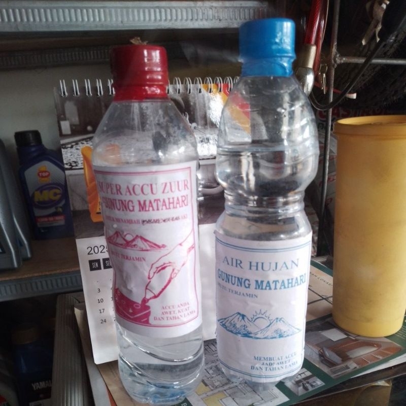 air aki accu motor mobil botol merah/biru 600ml